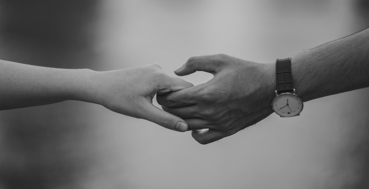 couple holding hands