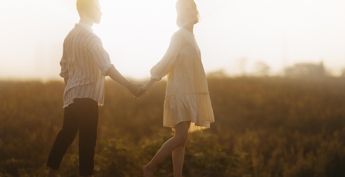 couple walking into the sunset