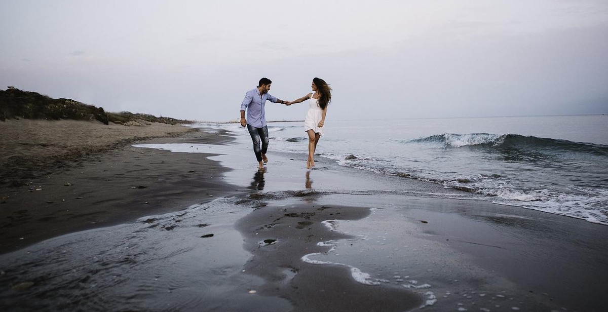 couple walking and holding hands