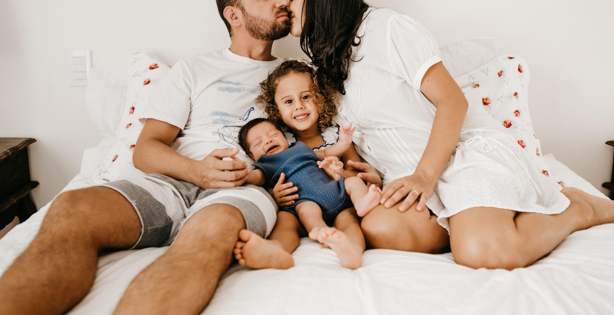 happy couple in bed